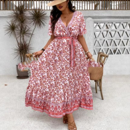 Vestido largo estampado con cuello de pico y cintura elástica