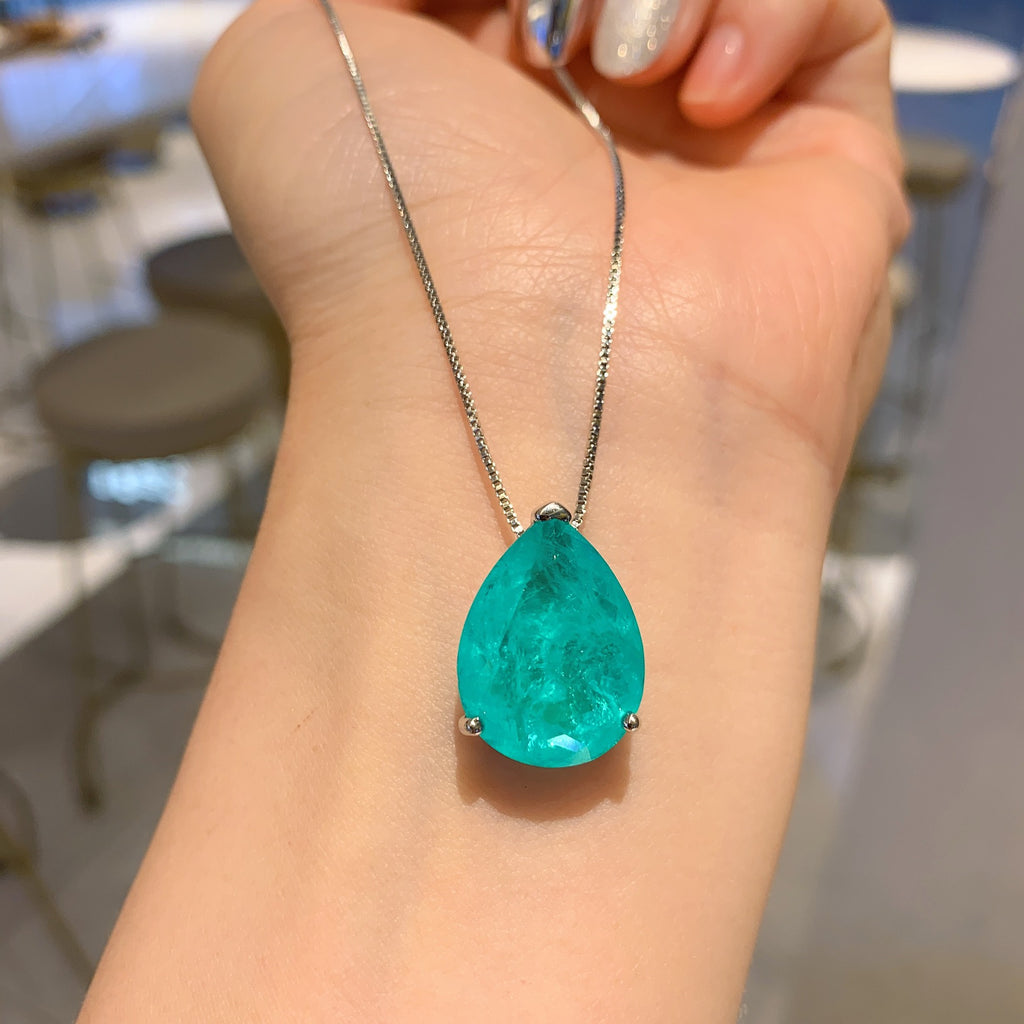Boucles d'oreilles pendantes poire émeraude