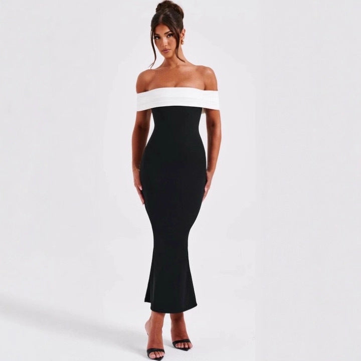 Robe moulante dos nu avec laçage et taille marquée