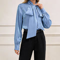 Minimalist Blue Top with Long Sleeves and Lace-Up Details