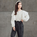 Camisa suelta de algodón para niña