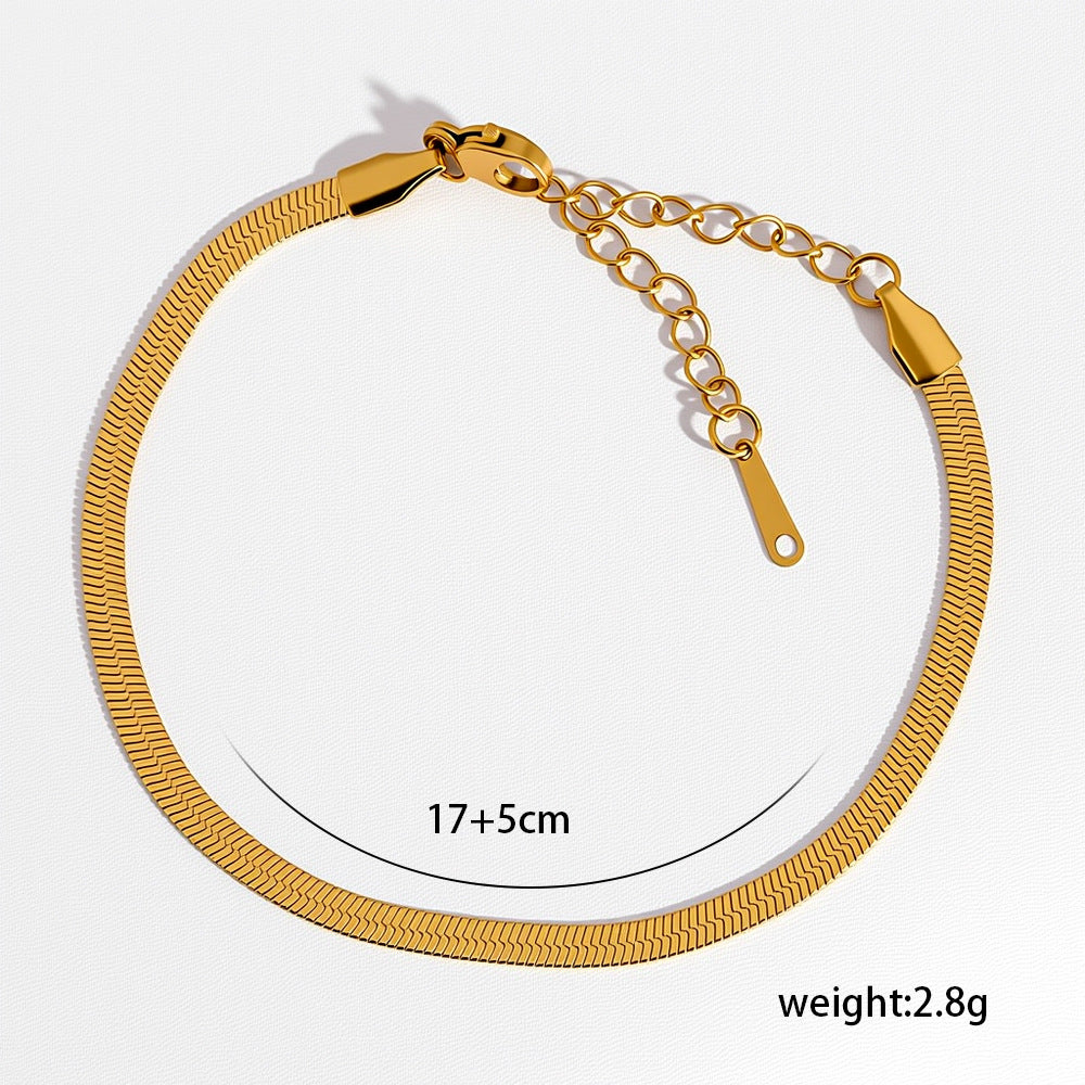 Pulsera esencial en tono dorado