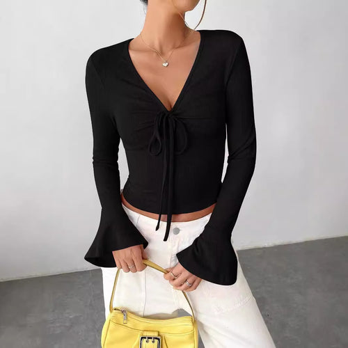 Blusa elegante urbana con cuello con muescas y puños con lazo
