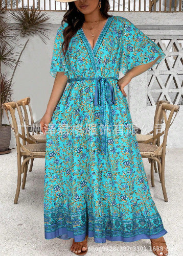 Vestido largo estampado con cuello de pico y cintura elástica