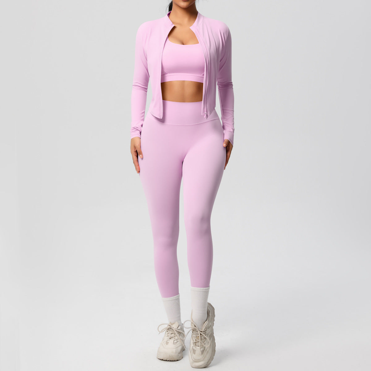 Conjunto deportivo ajustado de manga larga