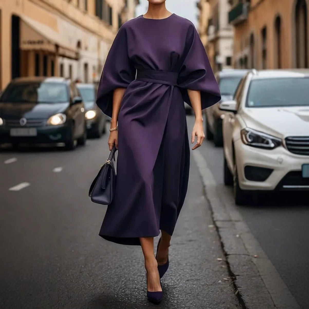 Elegante vestido con mangas murciélago y cinturón