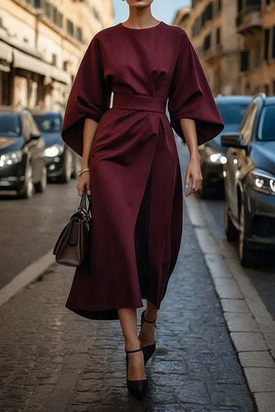 Elegante vestido con mangas murciélago y cinturón