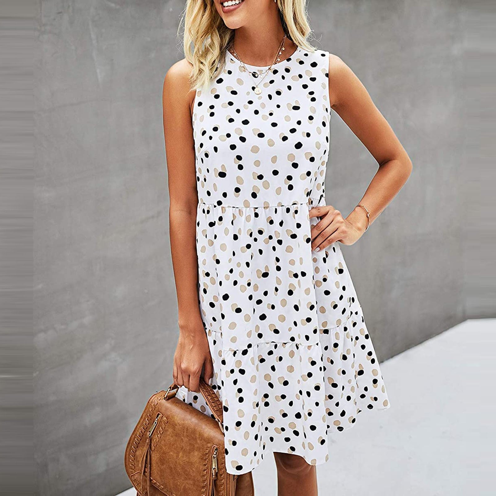 Vestido de verano sin mangas de lunares con bolsillos
