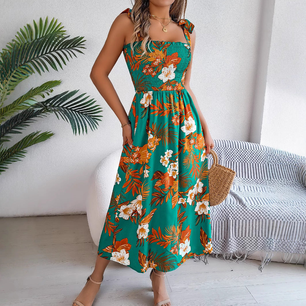Vestido largo floral con tirantes y cintura marcada