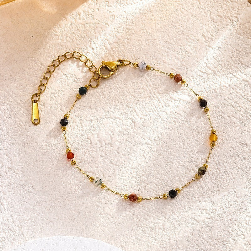 Pulsera con dije de corazón de piedra natural